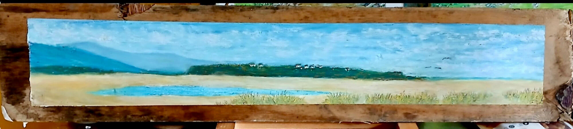 Hilbre Island Wirral coast. 2025. As seen from Red Rocks. Oil pastels on a two and a half foot piece of Irish Sea Driftwood.